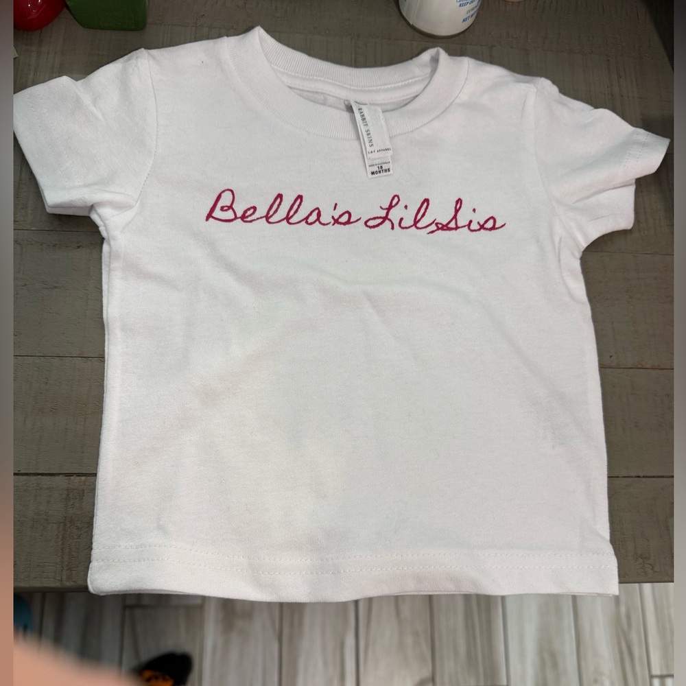 “Bella’s Lil Sis” Rabbit Skins White Tee